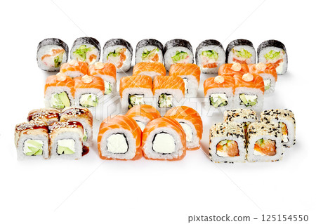 Variety of delicious sushi rolls displayed on white background 125154550