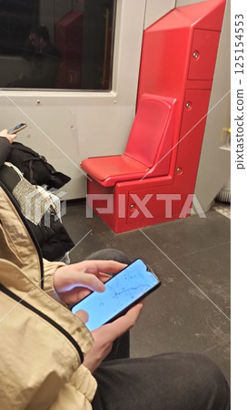 A person checking a navigation map A person checking a navigation map 125154553