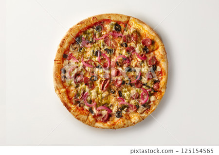 Delicious pizza with pesto, pepperoni, red onion, black olives, and mozzarella cheese on white background 125154565