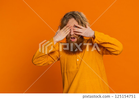 Afraid shocked Caucasian man closing eyes confused shy scared reject to watch phobia shame stress Afraid shocked Caucasian man closing eyes confused shy scared reject to watch phobia shame stress 125154751
