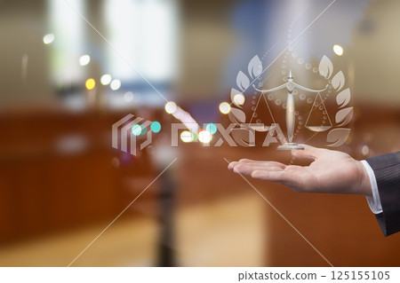 The concept of the symbol of justice and the hand of the law. The concept of the symbol of justice and the hand of the law. 125155105