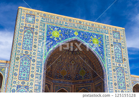 Vibrant Islamic building showcasing stunning tilework and intricate designs 125155128