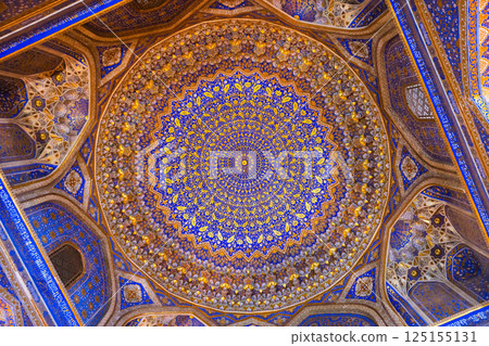 Detailed geometrical designs in azure and gold 125155131