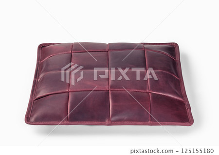 Burgundy leather cushion floating on white background: modern home decor 125155180
