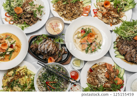 assortment of mixed traditional vietnamese food dishes on buffet table 125155459