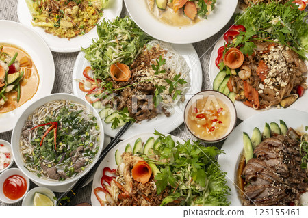 assortment of mixed traditional vietnamese food dishes on buffet table 125155461