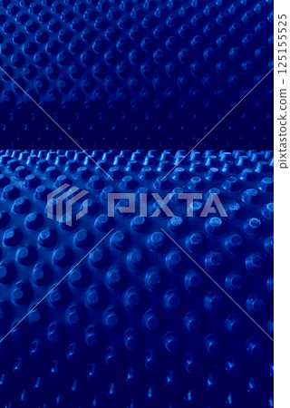 Abstract Background With Blue Extruded Cells On Rolled Surface. Pattern Of Abstract Blue Elements In A Rolls Abstract Background With Blue Extruded Cells On Rolled Surface. Pattern Of Abstract Blue Elements In A Rolls 125155525