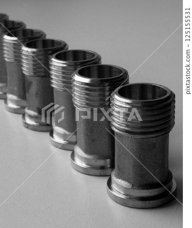 Threaded Plumbing Fitting Made With Cast Iron Arranged In Row Isolated Stock Photo 125155531