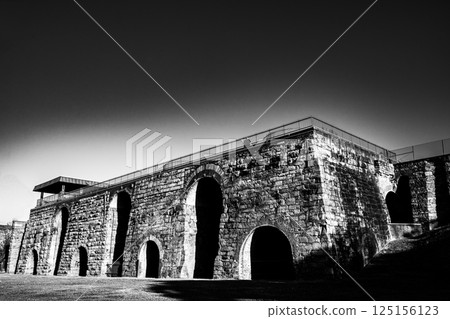 View of the ruined Scranton Iron Furnaces stone facade in Pennsylvania View of the ruined Scranton Iron Furnaces stone facade in Pennsylvania 125156123
