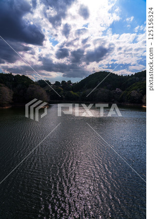 Nunome Dam during cherry blossom season - Clouds rising above Nunome Lake ⑪ 125156324