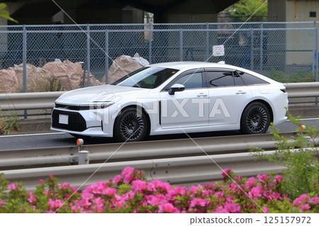 White sedan image 125157972