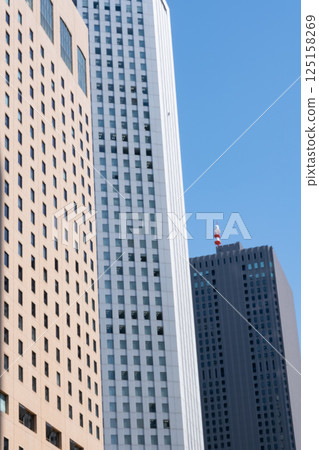 Landscape of the office town looking up at a skyscraper 125158269