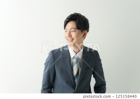 portrait of man in suit 125158440