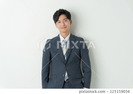 portrait of man in suit 125159056