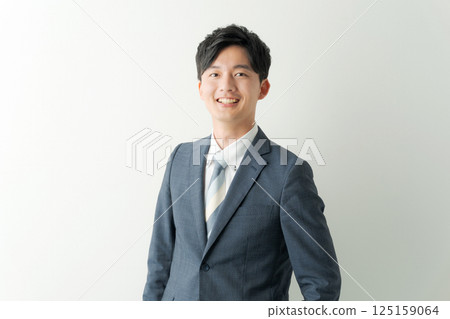 portrait of man in suit 125159064