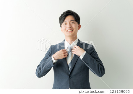 portrait of man in suit 125159065