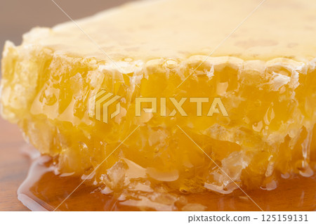 Close-up of comb honey full of honey Close-up of comb honey full of honey 125159131