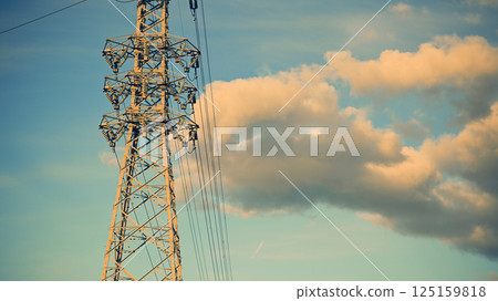 Sunset sky and high voltage line 125159818