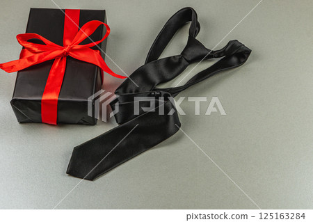 Celebrate Father's Day with a thoughtful tie gift and special moments shared Celebrate Father's Day with a thoughtful tie gift and special moments shared 125163284