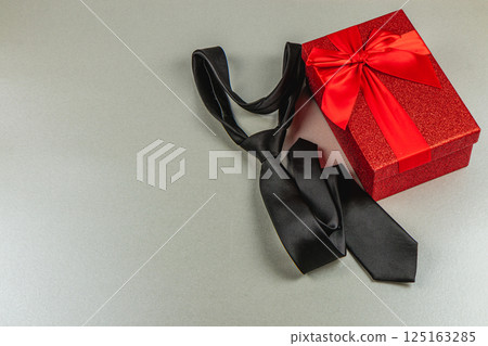 Thoughtful gifts for father's day celebration with tie and present Thoughtful gifts for father's day celebration with tie and present 125163285