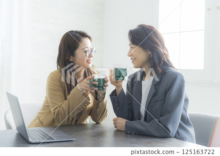 Business woman having a meeting Business woman having a meeting 125163722