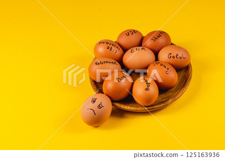 Choices illustrated with eggs on a yellow background 125163936