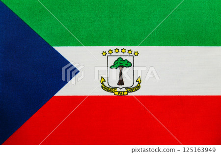 Flag of Equatorial Guinea with vibrant colors and emblem 125163949