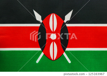 Kenyan flag displayed prominently in vibrant colors 125163967