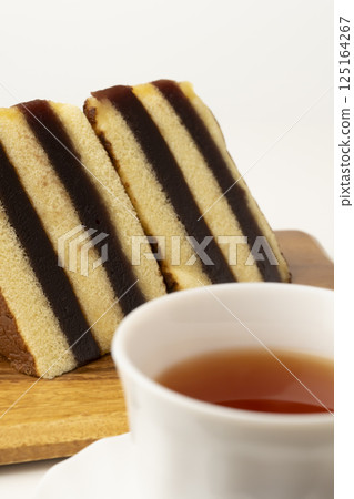 Siberia Yokan Castella Retro and nostalgic sweets and tea on a white background 125164267