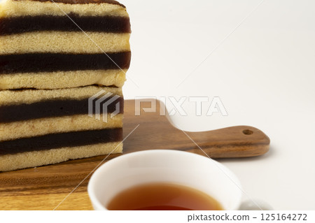 Siberia Yokan Castella Retro and nostalgic sweets and tea on a white background Siberia Yokan Castella Retro and nostalgic sweets and tea on a white background 125164272