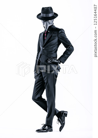 Plague doctor posing in a suit and plague mask 125164487