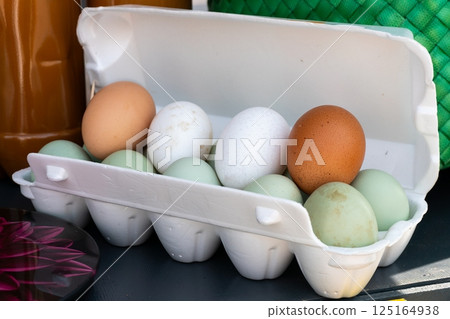 Open egg carton with chicken eggs Open egg carton with chicken eggs 125164938