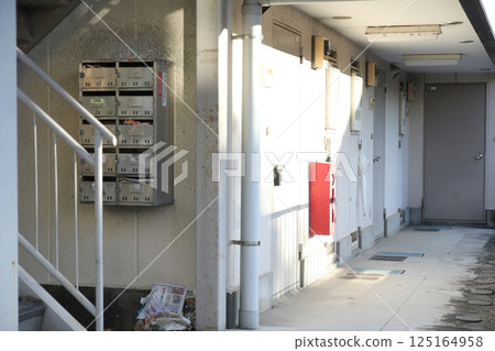 Apartment mailbox and stairs 125164958