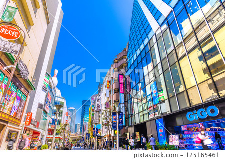 Tokyo cityscape in April, Japan. Overlooking the bustling shopping district in front of Ikebukuro Station on the 16th Tokyo cityscape in April, Japan. Overlooking the bustling shopping district in front of Ikebukuro Station on the 16th 125165461