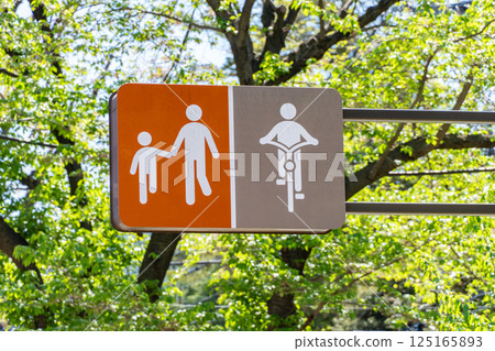 Signs indicating footpath and bike path areas Signs indicating footpath and bike path areas 125165893