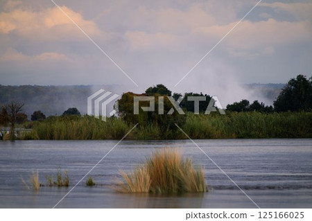 Victoria Falls seen from the Zambezi River in Zimbabwe Victoria Falls seen from the Zambezi River in Zimbabwe 125166025