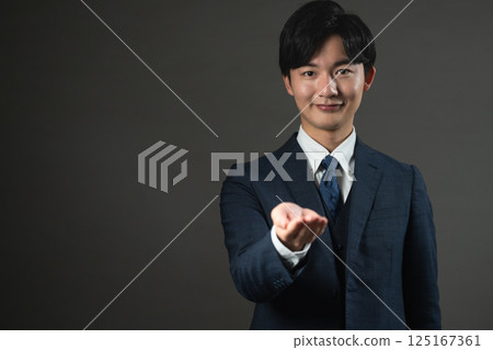 Young man in a suit Business image 125167361