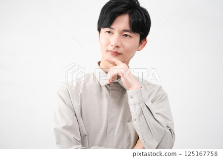 Young man wearing a long-sleeved shirt Lifestyle image 125167758