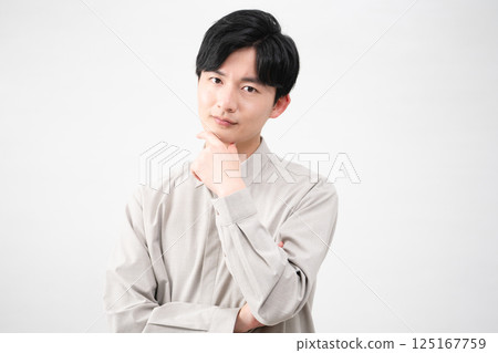 Young man wearing a long-sleeved shirt Lifestyle image 125167759