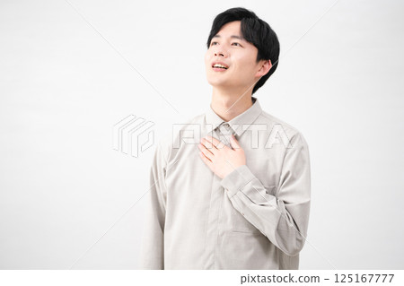 Young man wearing a long-sleeved shirt Lifestyle image 125167777