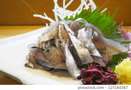 A specialty of the Seto Inland Sea and Hiroshima with a clear taste. Small sardine sashimi photo 125168367