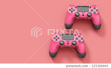 Realistic red video game joysticks or gamepads on pink background 125168443