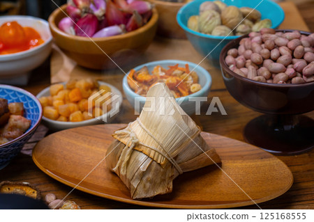 Traditional Taiwanese Zongzi and various ingredients on display 125168555