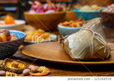 Traditional Taiwanese Zongzi and various ingredients on display Traditional Taiwanese Zongzi and various ingredients on display 125168559