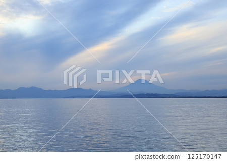 A view of Mt. Fuji turning blue after sunset from the west promenade of Katase Fishing Port 125170147