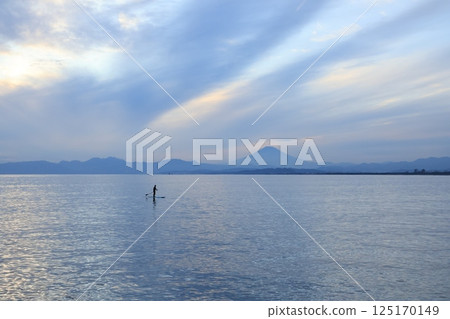 A view of Mt. Fuji turning blue after sunset from the west promenade of Katase Fishing Port 125170149