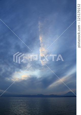 A view of Mt. Fuji turning blue after sunset from the west promenade of Katase Fishing Port A view of Mt. Fuji turning blue after sunset from the west promenade of Katase Fishing Port 125170152