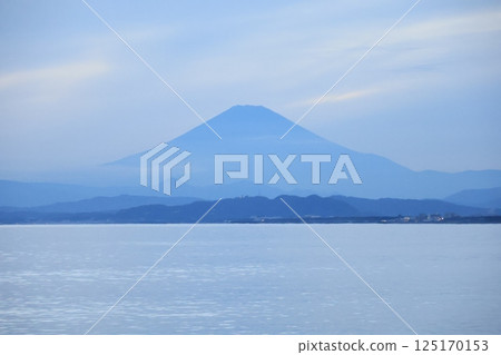 A view of Mt. Fuji turning blue after sunset from the west promenade of Katase Fishing Port A view of Mt. Fuji turning blue after sunset from the west promenade of Katase Fishing Port 125170153