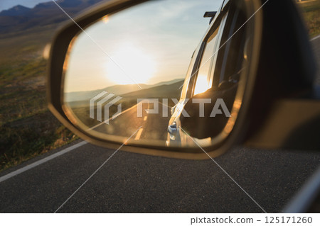 Driving offroad car on high elevation mountains Driving offroad car on high elevation mountains 125171260