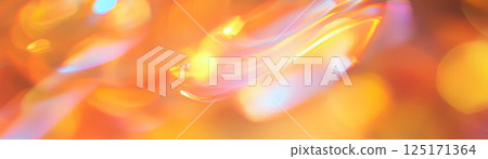 Bright autumn leaves blend in warm tones, creating a soft, inviting background. 125171364